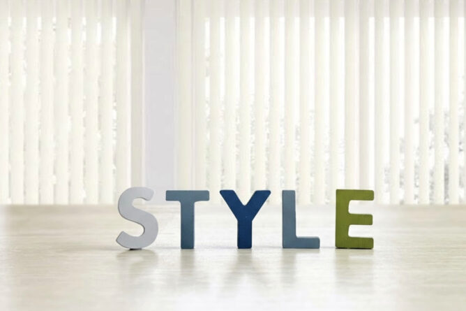 35370681_m | M Virtual(エムバーチャル) - Vライバーマネジメント事務所 Colorful letter blocks spelling STYLE on a light wooden floor with vertical blinds in the background.